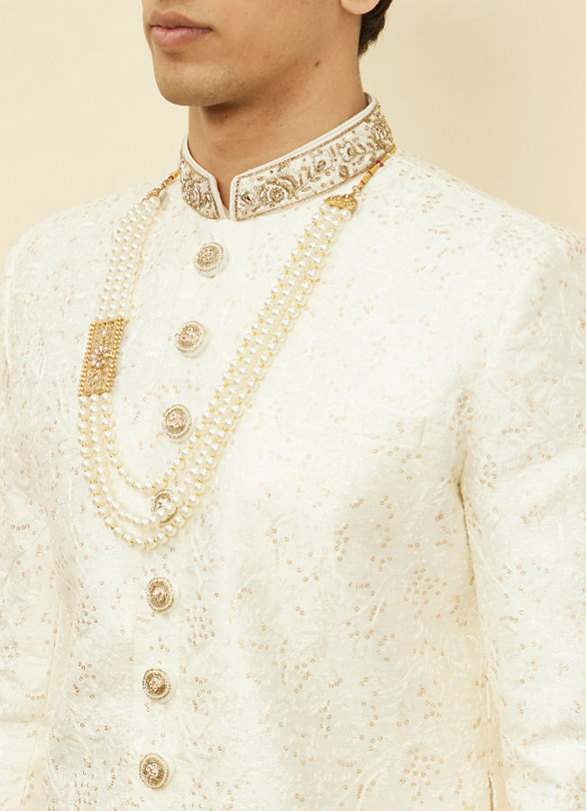 alt message - Manyavar Men Pearled Ivory White Bel Buti Patterned Sherwani Set image number 1